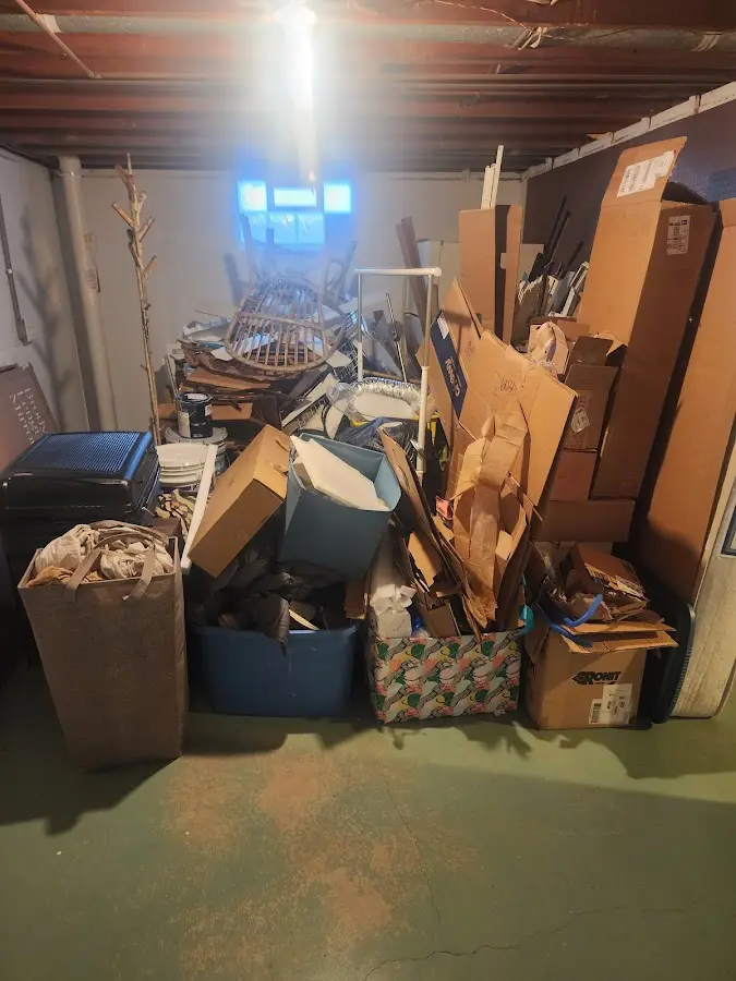 Roll-off dumpster container at job site for Yard Waste Dumpster Rental in Navarre